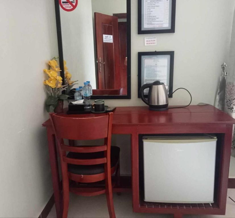 Desk, mini-fridge and kettle